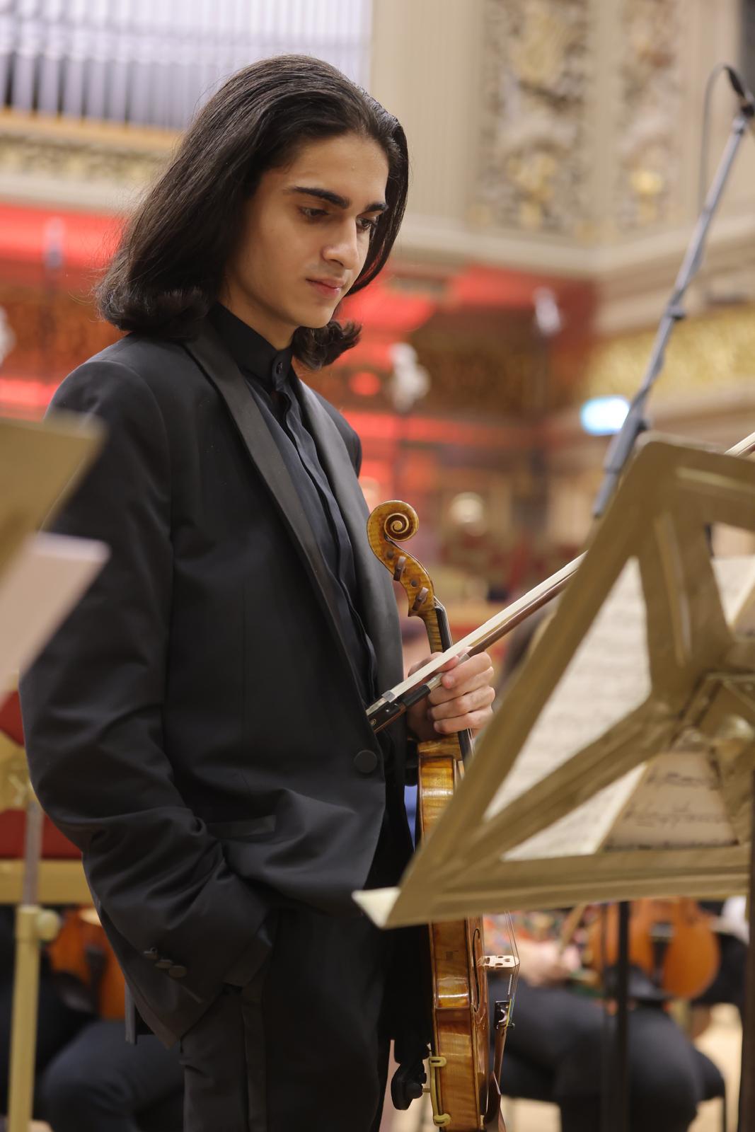 Antonio Piculeață beside the music stand before performing