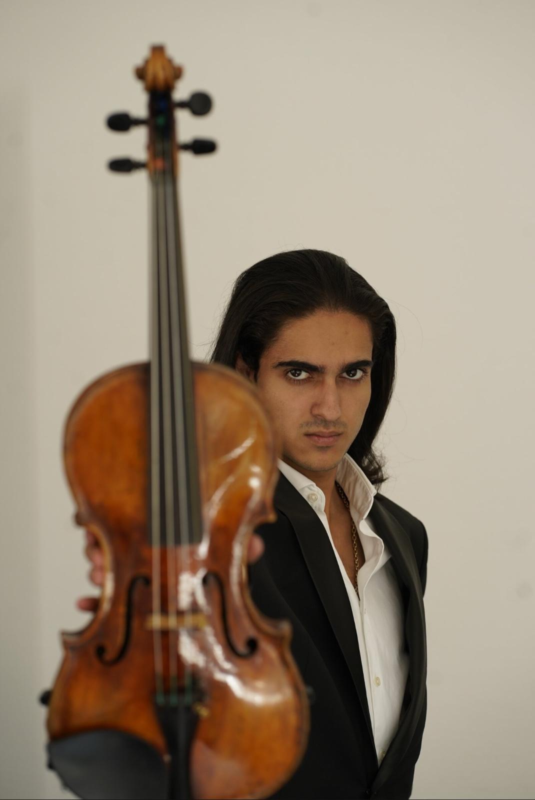 Portrait of violinist Antonio Piculeață with his violin